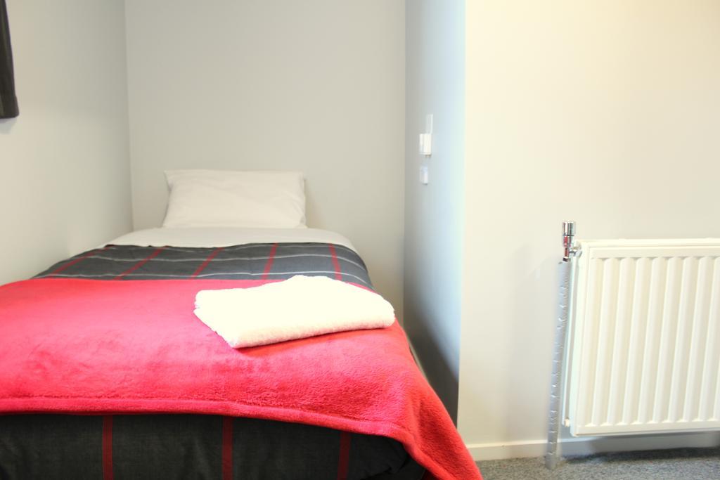 Urbanz Hostel Christchurch Kamer foto A single room at the hotel